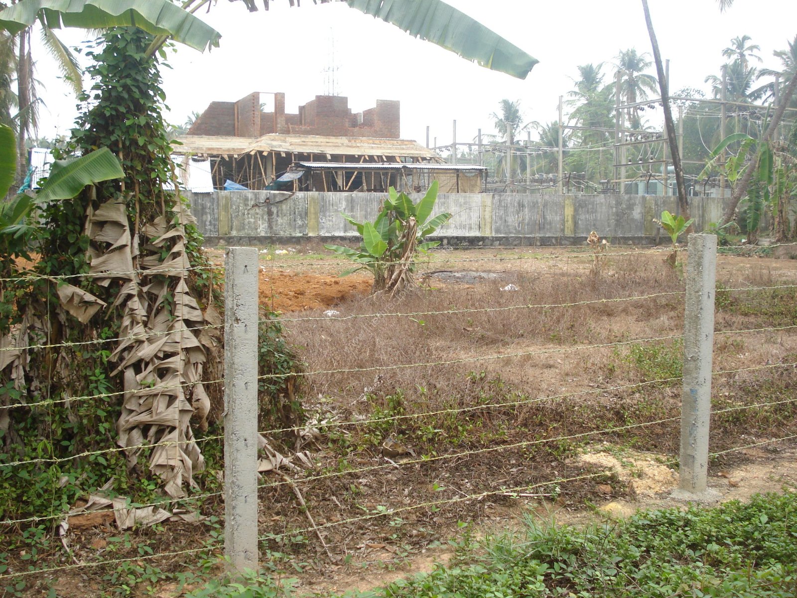 PROPERTY – KSEB OFFICES IN SIGHT BEHIND THEIR BOUNDRY WALL