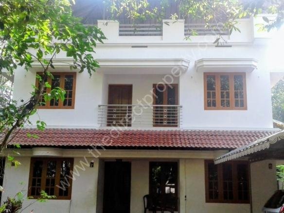 House with land in Karukutty Koratty