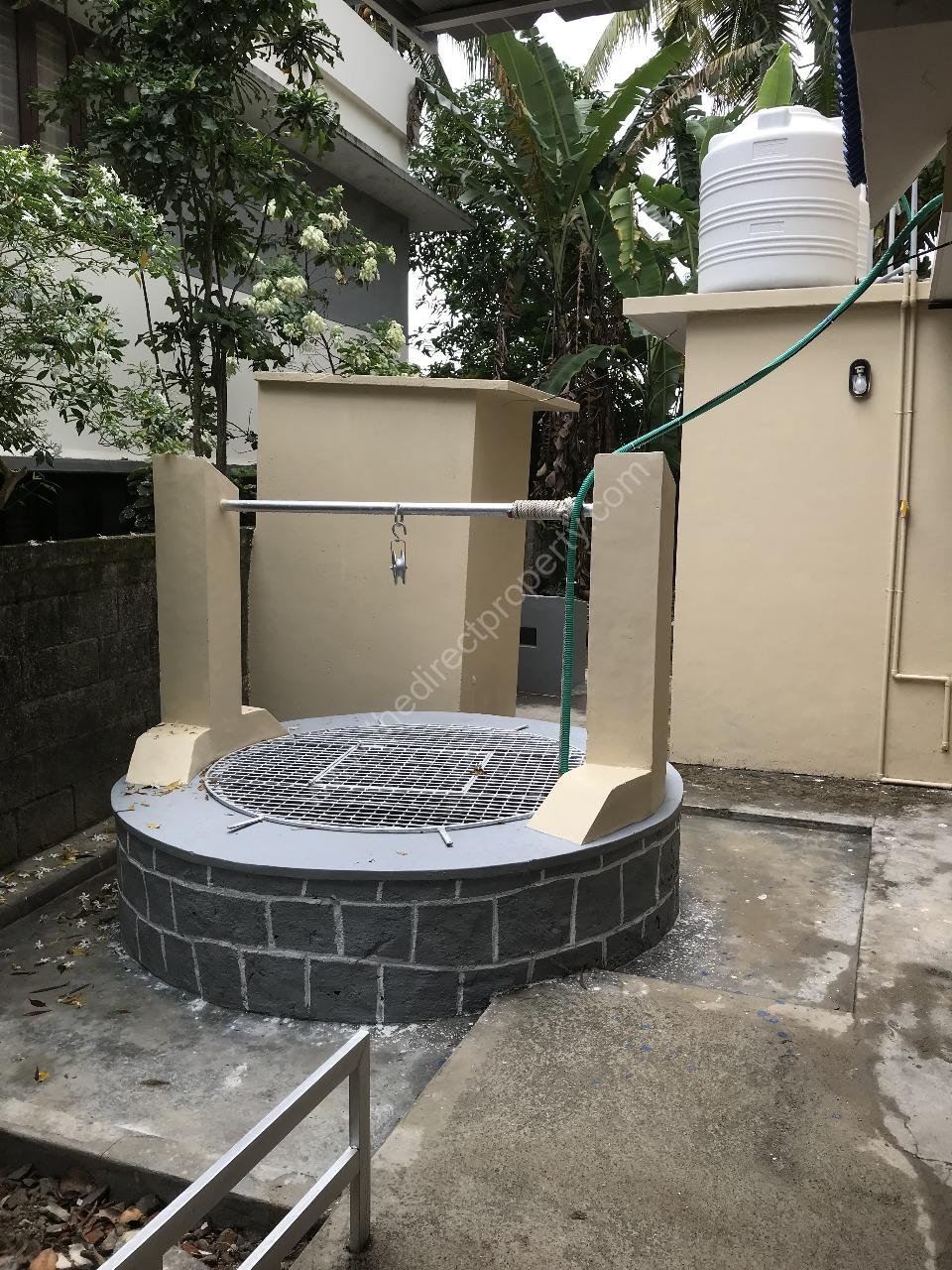 Well + Maid shower room backside