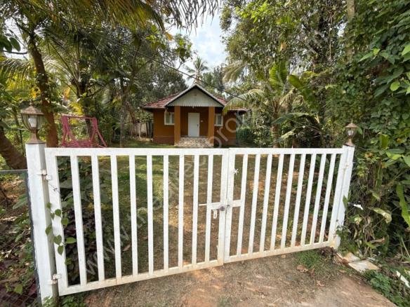 Farm House of 10 cents with running business HomeStay in Kalpetta